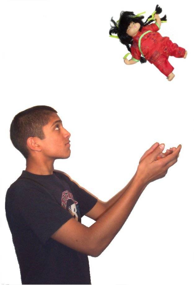 Boy throwing doll.jpg
